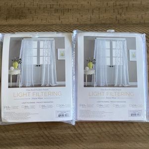 Set of light filtering white curtains